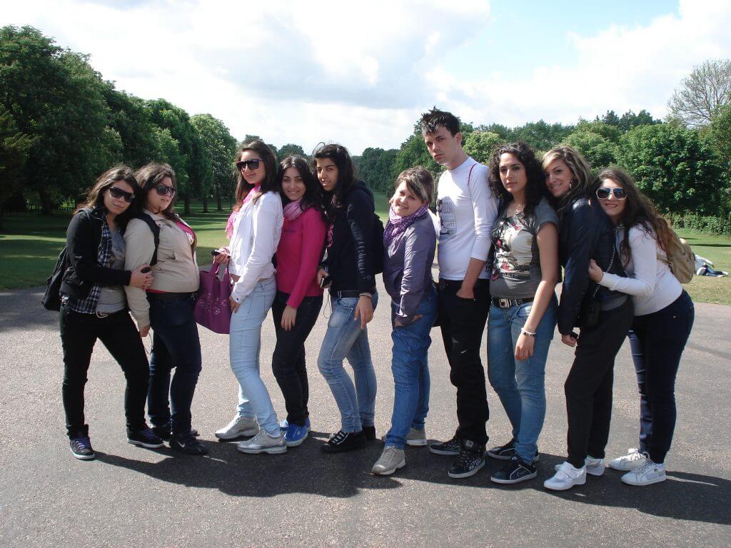 Group of teenage children on educational tour to Windsor