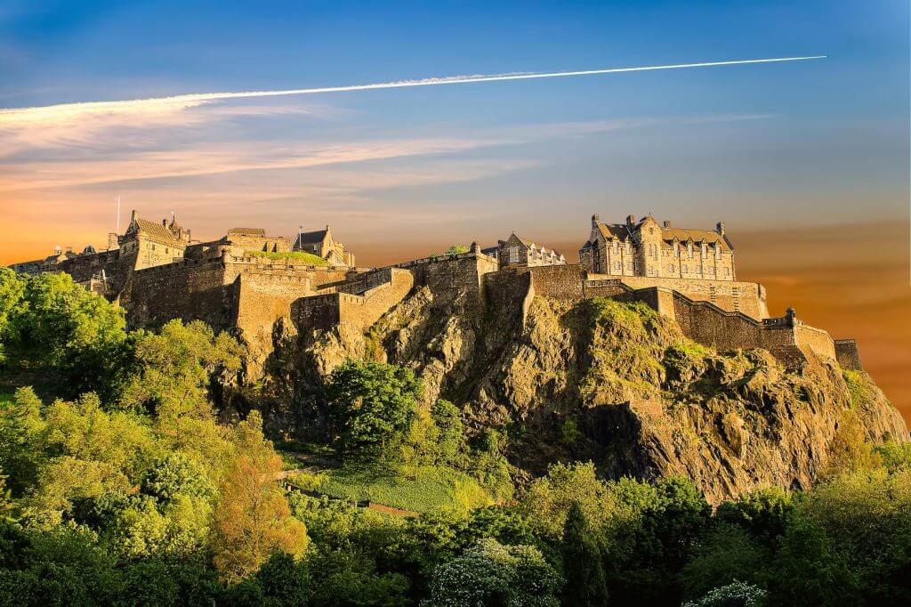 Edinburgh Castle perched on a rock at sunset