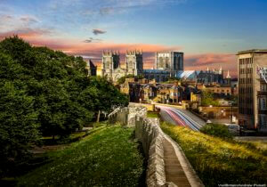 The centre of York, surrounded by walls whose foundations date back to medieval times. There is a wall walk around the city. York Minster at sunset. This image must be reproduced with the credit 'VistBritain/Andrew Pickett'